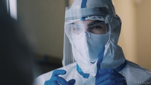 Lola Fae is seen leaving her safety suit uniform in a pandemic scene.
