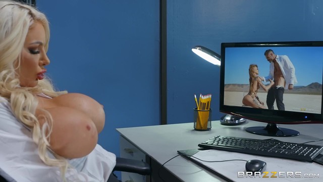 Nicolette Shea exited the office with a large-boobed blonde MILF, engaging in a quickie office sex session in her clothes and with a deep throat.